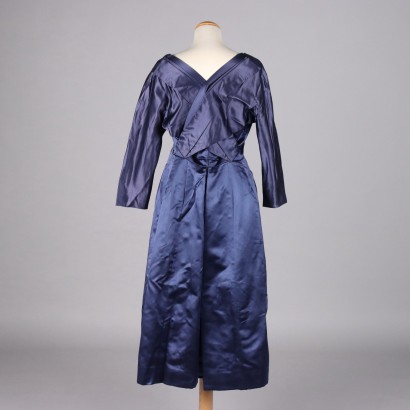 Robe vintage en satin bleu avec sac à main