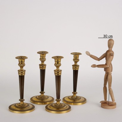 Group of Four Empire Candlesticks Attr