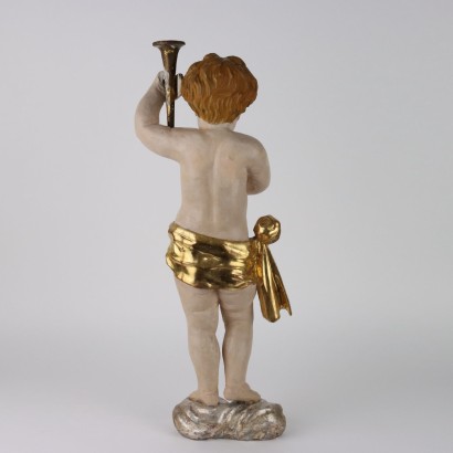 Putto tenant le flambeau