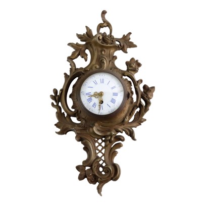 Reloj de pared de bronce dorado